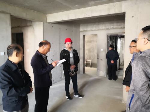 陜煤建設(shè)銅煤公司承建的玫瑰園小區(qū)多棟樓順利通過竣工驗收