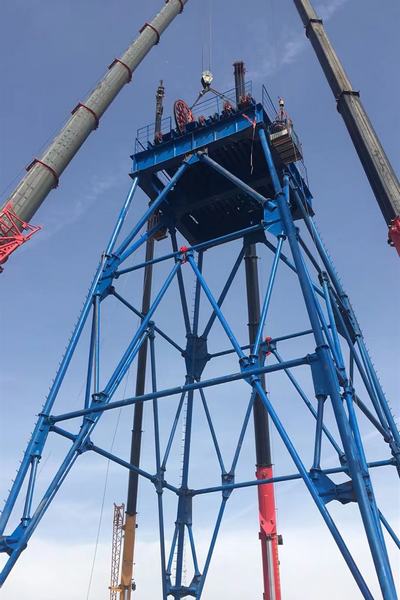 陜煤建設礦建二公司第三項目部進風立井井架順利安裝合攏